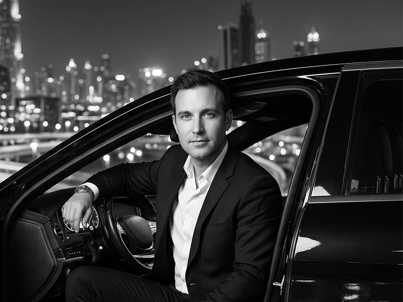 Black and White Luxury Car Portrait with Night Cityscape Prompt - Gemini Prompt
